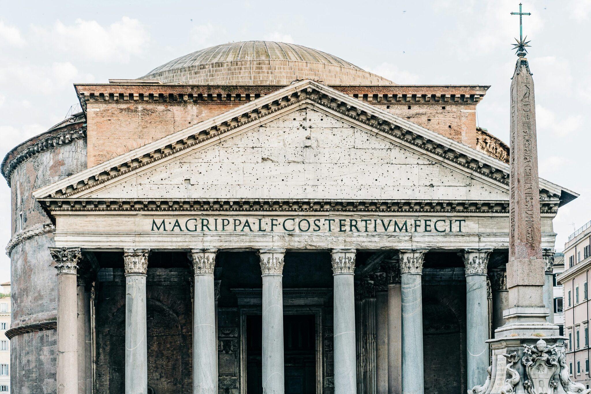 Front view of the ancient Pantheon with its Corinthian columns, dome and Latin inscription in Rome