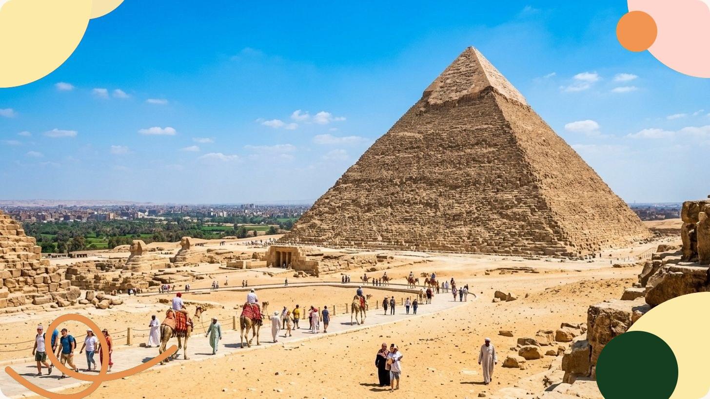 View of the Giza pyramids rising from the Egyptian desert under a clear blue sky, icons of the ancient world's greatest wonders