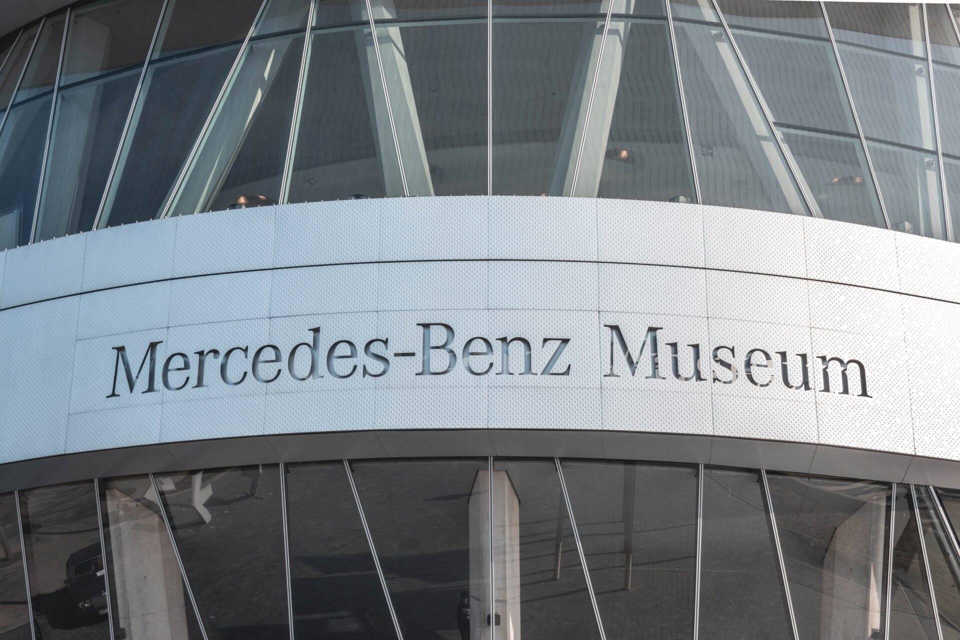 Modern Mercedes-Benz museum facade with its distinctive signage and contemporary glazing